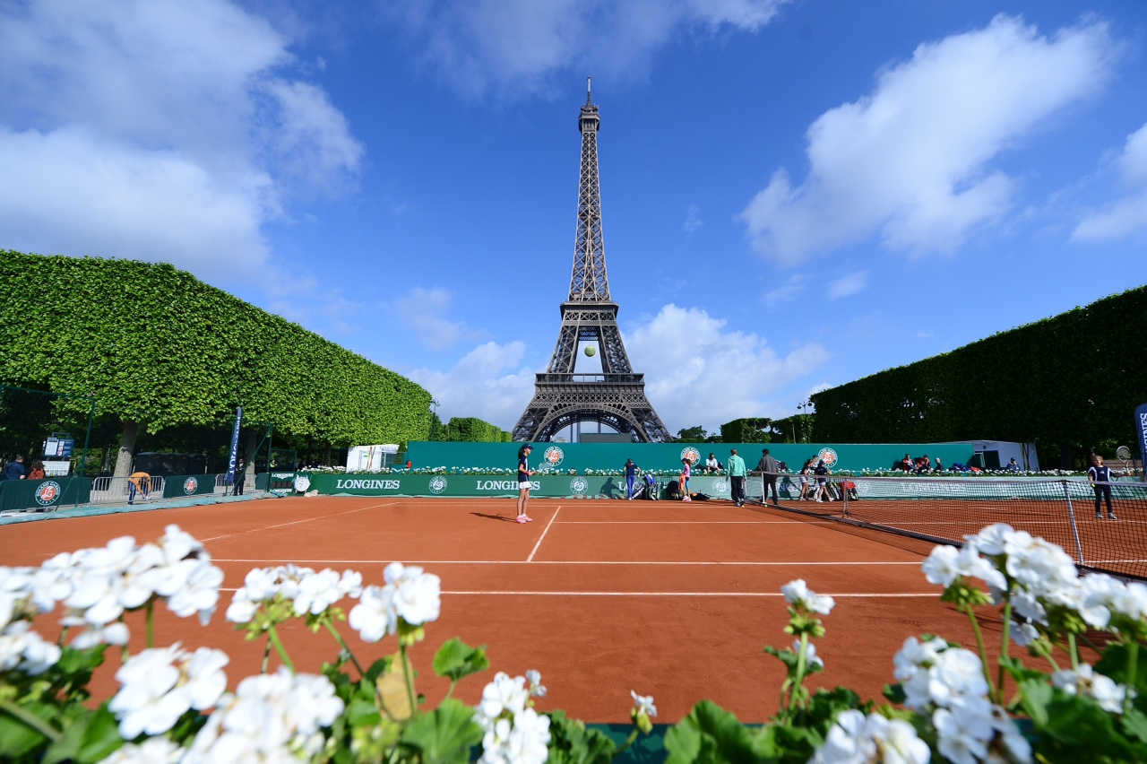 Clay court tennis with the Eiffel Tower in Paris